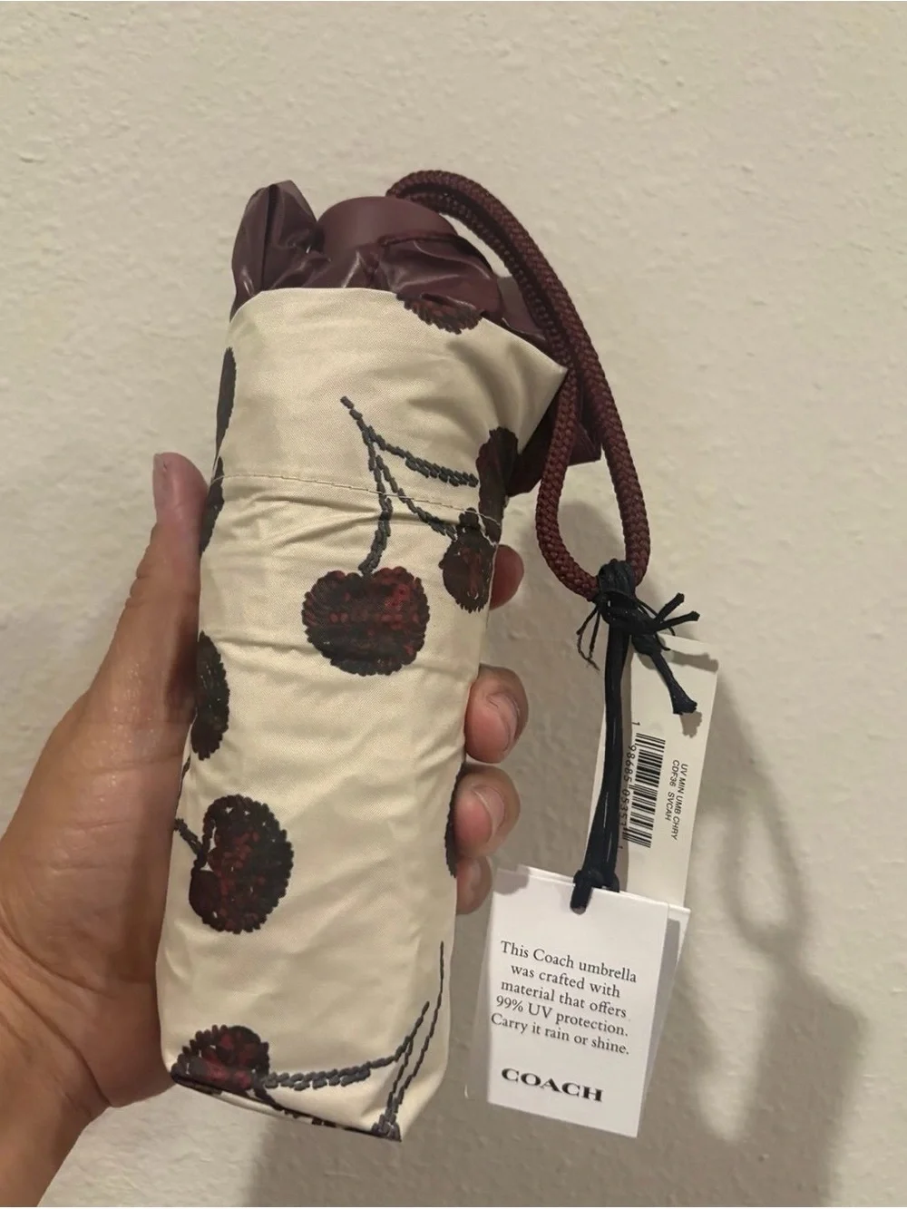 COACH Beige Floral Cosmetic Pouch with Maroon Accents